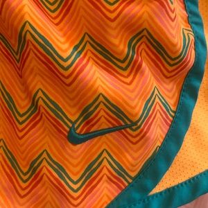 orange nike shorts